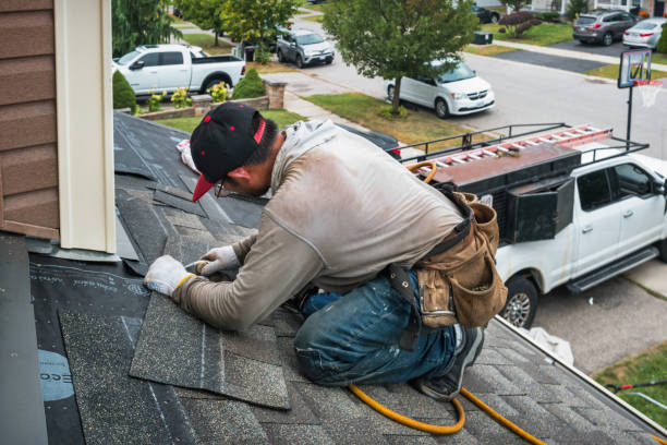 Professional Roof Replacement technician working in Arnold, CA